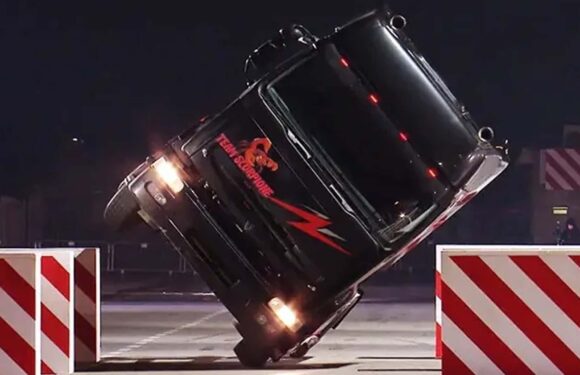 Stuntman Sets Guinness Record Driving Truck On Side Wheels Through Tight Gap