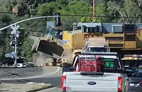 Watch Train Toss Tractor Like A Toy In Semi-Truck Collision